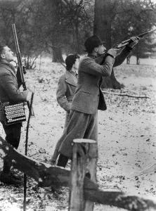 Leonard Prints: Earl of Shrewsbury, Miss Lane and their chauffeur on a shoot, c1946
