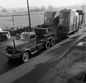 Early 1940s Diamond T truck pulling a large load, South Yorkshire, 1962