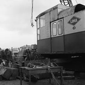 Early 1940s Diamond T truck pulling a large load, South Yorkshire, 1962