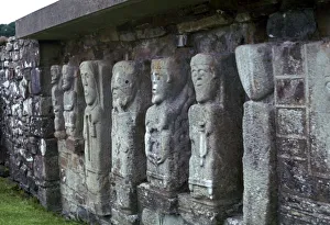 In A Row Prints: Early Christian figures showing the influence of pagan Celtic carvings, 6th century