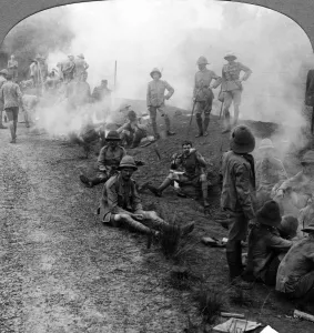 Early morning camp fires and breakfast, Persian Gulf, World War I, 1914-1918. Artist: Realistic Travels Publishers