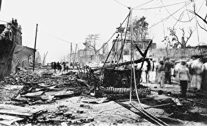 Images Dated 7th March 2008: Earthquake damage and a burnt car, King Street, Kingston, Jamaica, 1907