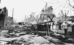 Jamaican Collection: Earthquake damage and a burnt car, King Street, Kingston, Jamaica, 1907