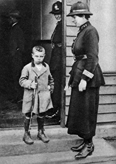 Police Station Prints: An East End child and a policewoman, London, 1926-1927