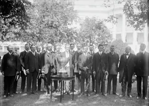 Eastern Yacht Club - President Wilson Presenting Club Cup To Owner of Yacht Ellen Who Won... 1913 Creator: Harris & Ewing. Eastern Yacht Club - President Wilson Presenting Club Cup To Owner of Yacht Ellen Who Won