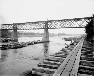 Lumber Industry Prints: Eau Claire from the railroad bridge, between 1880 and 1899. Creator: Unknown