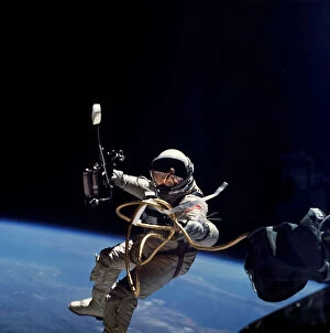 Reflected Collection: Ed White performs first U.S. spacewalk, 1965. Creator: James A McDivitt