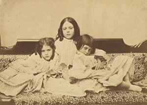 Alice Gallery: Edith, Ina and Alice Liddell on a Sofa, Summer 1858. Creator: Lewis Carroll