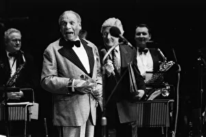 Mixed Race Group Prints: Edmundo Ross and Orchestra, Michael Aspel, 1994. Creator: Brian Foskett