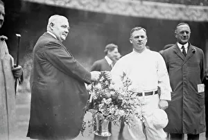 Baseball Prints: Edward McCall presents a silver basket of flowers to New York Giants manager John McGraw