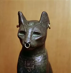 Bast Collection: Egyptian Bronze Cat, Sacred to the Goddess Bastet, Roman Period. c664BC-332 BC
