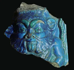 Egyptian faience head of Bes