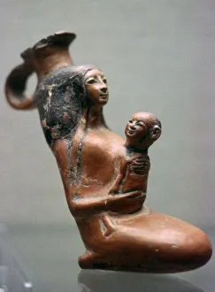 Egyptian mother and child vase