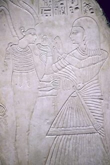 Osiris Gallery: Egyptian relief of Amon making an offering to Osiris