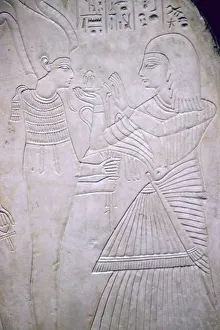 Osiris Gallery: Egyptian relief of Amon making an offering to Osiris