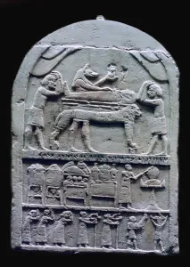 Anubis Collection: Egyptian stele showing Anubis preparing a mummy