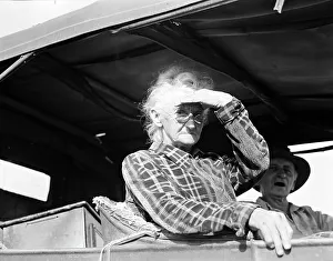 Eighty year old woman living in squatters camp on the outskirts of Bakersfield, California, 1936. Creator: Dorothea Lange