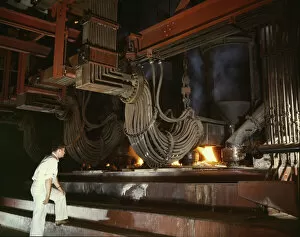 Manufacturing Gallery: Electric phosphate smelting furnace used in the making of elem...Muscle Shoals area, Alabama, 1942