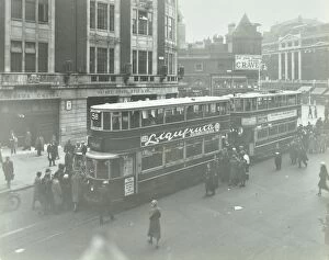 Guildhall Library Art Gallery: Electric trams at Victoria Terminus, London, 1932