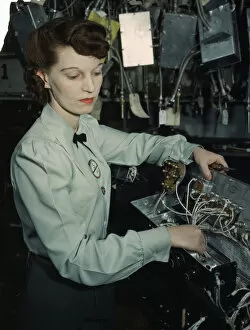 Make Up Gallery: Electronics technician, Goodyear Aircraft Corp. Akron, Ohio, 1941. Creator: Alfred T Palmer