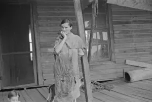 Ragged Gallery: Elizabeth Tengle on porch, Hale County, Alabama, 1936. Creator: Walker Evans