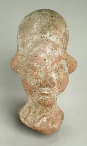 Central Asia Prints: Elongated Female Head, 5th-6th century. Creator: Unknown