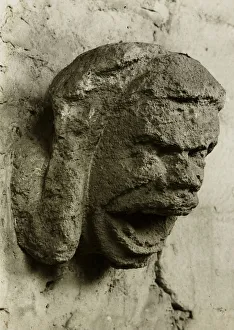 Ely Cathedral: Head in South Nave Triforium, c. 1891. Creator: Frederick Henry Evans