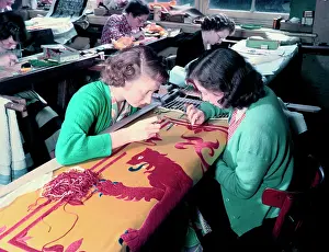 Embroidering the Royal Standard of Scotland used at the coronation of Queen Elizabeth II, 1953. Creator: Arthur Charles Kirby Ware