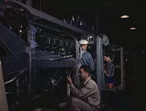 Employees at North American Aviation, Incorporated, assembling..., Inglewood, Calif., 1942. Creator: Alfred T Palmer