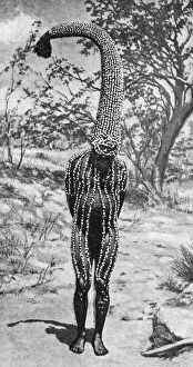 Hands Behind Back Gallery: An emu man performing the sacred totem of his group, Australia, 1922.Artist: Spencer and Gillen