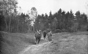 Clearing Prints: En Foret D'Argonne; Passage dangereux a travers une clairiere, 1915. Creator: Unknown