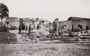 Brady Prints: [Encampment with shacks and laundry]. Brady album, p. 129, 1861-65. Creator: Unknown