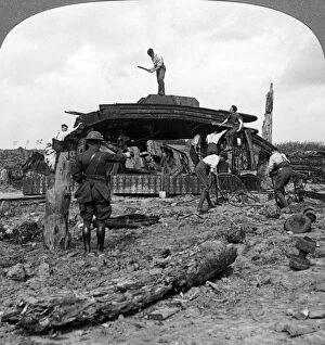 Armoured Warfare Gallery: Engineers clearing a destroyed tank from a road, World War I