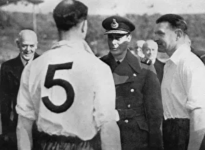 Player Prints: English footballer Eddie Hapgood meeting King George VI, c1937-c1944
