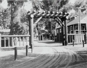 Logs Prints: Entrance to Marysville camp for migrants