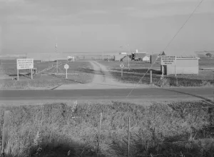 Entrance to Nyssa Farm family labor camp, FSA mobile unit... 1, Near Nyssa, Oregon, 1939. Creator: Dorothea Lange