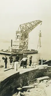 Crane Prints: Erection of HMAS Sydney mast, 1934. Creator: Unknown