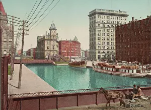 Telegraph Pole Prints: Erie Canal at Salina Street, Syracuse, ca 1900. Creator: Unknown