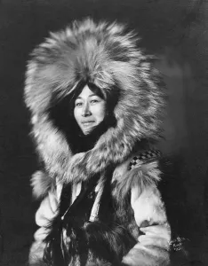 Alaska Prints: Eskimo woman posing, 1915(?). Creator: Lomen Brothers