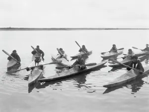 Kayak Prints: Eskimos in kayaks, Noatak, Alaska, c1929. Creator: Edward Sheriff Curtis