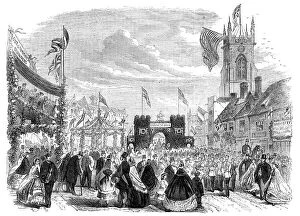 Crinoline Collection: The Essex Agricultural Society's Show at Halstead: triumphal arch near the old church, 1862