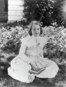 Ethel Roosevelt in the garden, c1902 June 17. Creator: Frances Benjamin Johnston