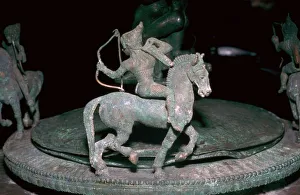 Detail of an Etruscan bronze of an Amazon archer, 6th century BC Detail of an Etruscan bronze of an Amazon archer, 6th century BC