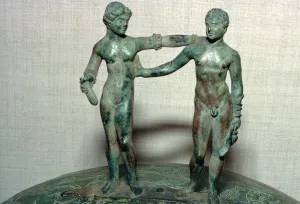 Etruscan bronze figures from the lid of a bronze vessel Etruscan bronze figures from the lid of a bronze vessel