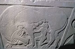 Beast Gallery: Etruscan grave-slab showing a man being suckled by a beast, 5th century