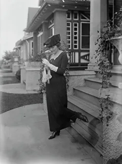 Adjusting Prints: Evelyn Herbert, between c1915 and c1920. Creator: Bain News Service