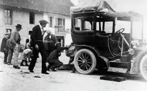 Customs Prints: Examination of luggage on automobile