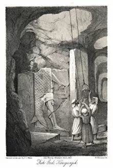Excavating a low-relief carving of the Fish god Dagon, Nineveh, 1853. Artist: N Chevalier