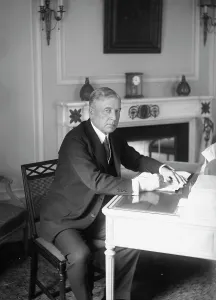 Illinois Prints: F. Lowden, seated at desk, writing, 1919. Creator: Bain News Service