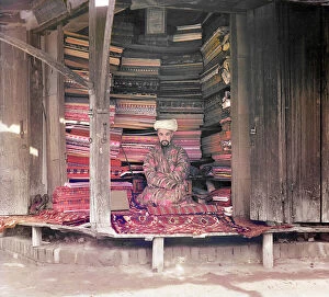 Market Collection: Fabric merchant, Samarkand, between 1905 and 1915. Creator: Sergey Mikhaylovich Prokudin-Gorsky